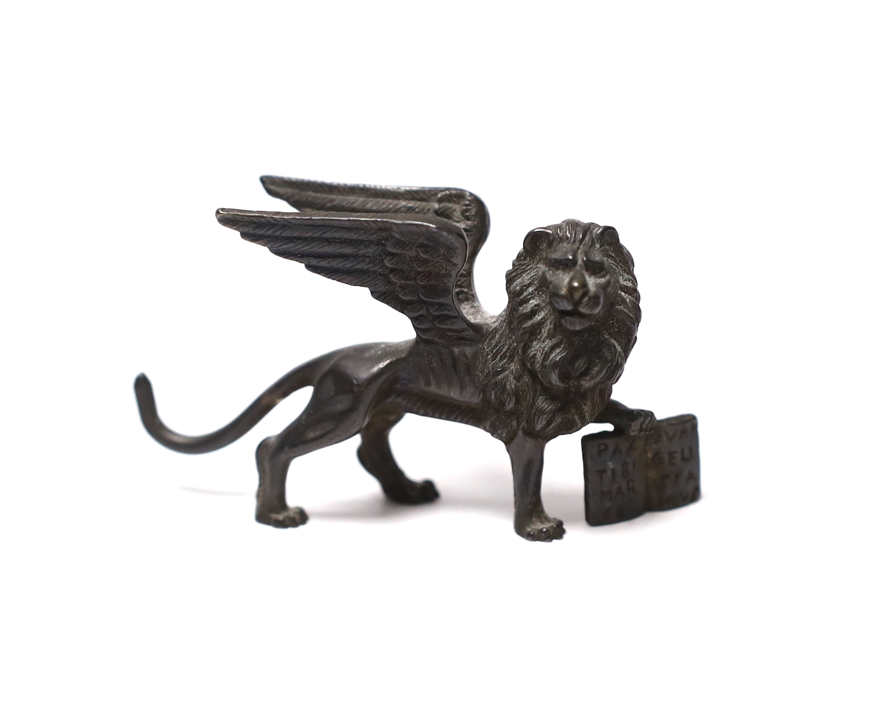 A Grand Tour miniature bronze Winged Lion of St. Mark, late 18th century, 7.5cm wide